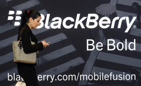 A woman uses her mobile phone at the Blackberry World Event in Orlando in this May 1, 2012 file photo. REUTERS/David Manning/Files A woman uses her mobile phone at the Blackberry World Event in Orlando in this May 1, 2012 file photo. REUTERS/David Manning/Files