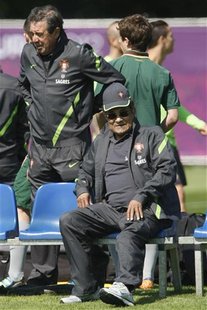 Former Portugal national soccer player Eusebio (R) watches a Portugal training session during the Euro 2012 at a training field in Opalenica Former Portugal national soccer player Eusebio (R) watches a Portugal training session during the Euro 2012 at a training field in Opalenica