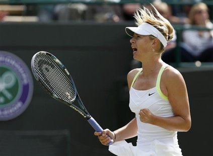 Maria Sharapova of Russia reacts after defeating Hsieh Su-Wei of Taiwan in their women's singles tennis match at the Wimbledon tennis champi Maria Sharapova of Russia reacts after defeating Hsieh Su-Wei of Taiwan in their women's singles tennis match at the Wimbledon tennis champi