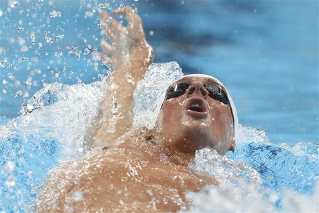 Ryan Lochte swims his men's 200m individual medley heat during the U.S. Olympic swimming trials in Omaha, Nebraska, June 29, 2012. REUTERS/J Ryan Lochte swims his men's 200m individual medley heat during the U.S. Olympic swimming trials in Omaha, Nebraska, June 29, 2012. REUTERS/J