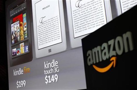 Graphics of the new Amazon Kindle tablets are seen at a news conference during the launch of Amazon's new tablets in New York, September 28, Graphics of the new Amazon Kindle tablets are seen at a news conference during the launch of Amazon's new tablets in New York, September 28,