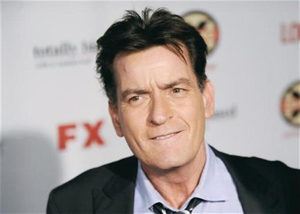 Actor Charlie Sheen arrives at the Hollywood FX Summer Comedies Party in Los Angeles, California June 26, 2012. REUTERS/Gus Ruelas Actor Charlie Sheen arrives at the Hollywood FX Summer Comedies Party in Los Angeles, California June 26, 2012. REUTERS/Gus Ruelas