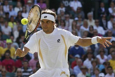 David Ferrer of Spain hits a return to Andy Roddick of the U.S. during their men's singles tennis match at the Wimbledon tennis championship David Ferrer of Spain hits a return to Andy Roddick of the U.S. during their men's singles tennis match at the Wimbledon tennis championship