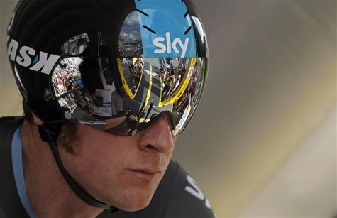 Sky Procycling rider Bradley Wiggins of Britain prepares to start the individual time trial in the first stage of the 99th Tour de France cy Sky Procycling rider Bradley Wiggins of Britain prepares to start the individual time trial in the first stage of the 99th Tour de France cy