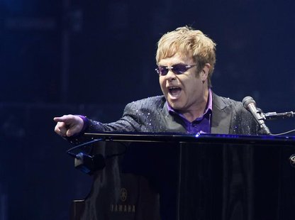 Singer Elton John performs at a charity concert dedicated to the fight against HIV/AIDS at Independence Square in Kiev June 30, 2012. REUTER Singer Elton John performs at a charity concert dedicated to the fight against HIV/AIDS at Independence Square in Kiev June 30, 2012. REUTER