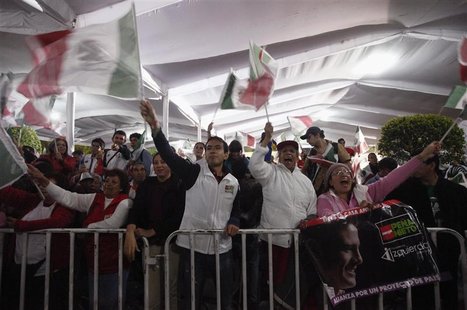 Supporters of Enrique Pena Nieto, presidential candidate of the Institutional Revolutionary Party (PRI), celebrate at the party headquarters Supporters of Enrique Pena Nieto, presidential candidate of the Institutional Revolutionary Party (PRI), celebrate at the party headquarters