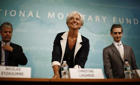 International Monetary Fund Managing Director Christine Lagarde arrives for a news conference following the release of the IMF's annual repo International Monetary Fund Managing Director Christine Lagarde arrives for a news conference following the release of the IMF's annual repo