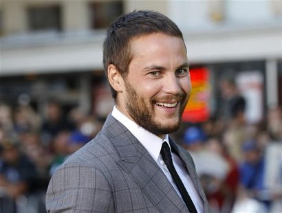 Cast member Taylor Kitsch arrives at the premiere of the film "Savages" in Los Angeles June 25, 2012. REUTERS/Danny Moloshok Cast member Taylor Kitsch arrives at the premiere of the film "Savages" in Los Angeles June 25, 2012. REUTERS/Danny Moloshok