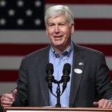 Michigan Republican Governor Rick Snyder introduces Mitt Romney, Republican presidential candidate and former Massachusetts governor, during Michigan Republican Governor Rick Snyder introduces Mitt Romney, Republican presidential candidate and former Massachusetts governor, during