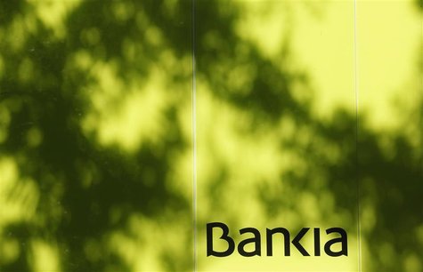 The logo of Bankia is seen at an ATM machine in Madrid June 25, 2012. REUTERS/Andrea Comas The logo of Bankia is seen at an ATM machine in Madrid June 25, 2012. REUTERS/Andrea Comas