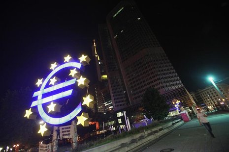 A sculpture showing the Euro currency sign is seen in front of the European Central Bank (ECB) headquarters in Frankfurt June 29, 2012. REUT A sculpture showing the Euro currency sign is seen in front of the European Central Bank (ECB) headquarters in Frankfurt June 29, 2012. REUT