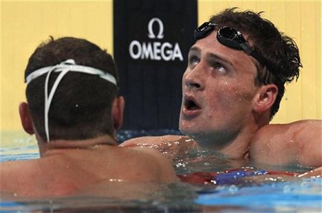 Ryan Lochte (R) is congratulated by a teammate after the men's 200m backstroke final during the U.S. Olympic swimming trials in Omaha, Nebra Ryan Lochte (R) is congratulated by a teammate after the men's 200m backstroke final during the U.S. Olympic swimming trials in Omaha, Nebra