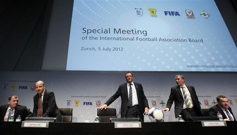 Members of the International Football Association Board (IFAB) leave a news conference following an IFAB special meeting at the Home of FIFA Members of the International Football Association Board (IFAB) leave a news conference following an IFAB special meeting at the Home of FIFA