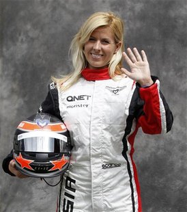 Marussia Formula One test driver Maria de Villota of Spain poses prior to the Australian F1 Grand Prix at the Albert Park circuit in Melbour Marussia Formula One test driver Maria de Villota of Spain poses prior to the Australian F1 Grand Prix at the Albert Park circuit in Melbour