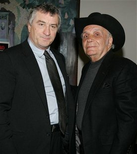 Actor Robert DeNiro, (L), with boxer and author Jake LaMotta, pose for photographers at a screening celebrating the 25th anniversary of "Rag Actor Robert DeNiro, (L), with boxer and author Jake LaMotta, pose for photographers at a screening celebrating the 25th anniversary of "Rag