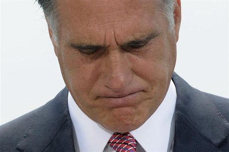 U.S. Republican Presidential candidate Mitt Romney pauses during his reaction to the Supreme Court's upholding key parts of President Barack U.S. Republican Presidential candidate Mitt Romney pauses during his reaction to the Supreme Court's upholding key parts of President Barack