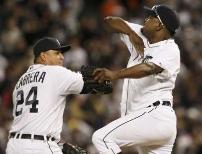 Miguel Cabrera and Jose Valverde celebrate a victory at Comerica Park in Detroit, October 3rd, 2011. Courtesy of Reuters. Miguel Cabrera and Jose Valverde celebrate a victory at Comerica Park in Detroit, October 3rd, 2011. Courtesy of Reuters.