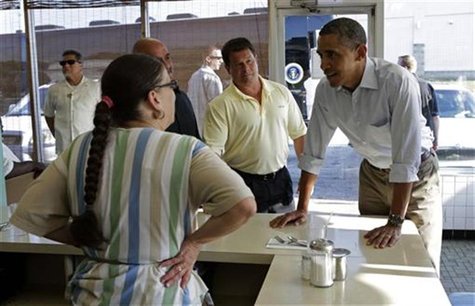 U.S. President Barack Obama (R) places his breakfast order during a visit to Ann's Restaurant in Akron, Ohio July 6, 2012. REUTERS/Kevin Lam U.S. President Barack Obama (R) places his breakfast order during a visit to Ann's Restaurant in Akron, Ohio July 6, 2012. REUTERS/Kevin Lam