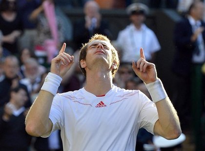 Andy Murray of Britain reacts after defeating Jo-Wilfried Tsonga of France in their men's semi-final tennis match at the Wimbledon tennis ch Andy Murray of Britain reacts after defeating Jo-Wilfried Tsonga of France in their men's semi-final tennis match at the Wimbledon tennis ch