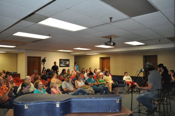 WDEZ Club members enjoy a personal performance from Rick Monroe
