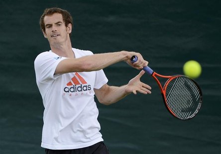 Andy Murray of Britain trains before his men's final tennis match on Sunday against Roger Federer of Switzerland, at the Wimbledon tennis ch Andy Murray of Britain trains before his men's final tennis match on Sunday against Roger Federer of Switzerland, at the Wimbledon tennis ch