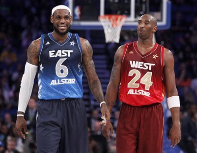 East All-Star LeBron James of the Miami Heat (L) and West All-Star Kobe Bryant of the Los Angeles Lakers exchange words in the fourth quarte East All-Star LeBron James of the Miami Heat (L) and West All-Star Kobe Bryant of the Los Angeles Lakers exchange words in the fourth quarte