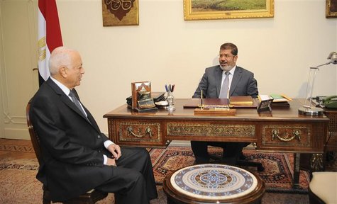 Egypt's President Mohamed Mursi (R) meets Arab League head Nabil El-Arabi at the presidential palace in Cairo July 8, 2012. REUTERS/Egyptian Egypt's President Mohamed Mursi (R) meets Arab League head Nabil El-Arabi at the presidential palace in Cairo July 8, 2012. REUTERS/Egyptian