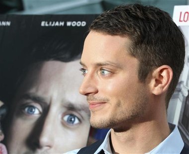 Elijah Wood, star of 'Wilfred' arrives at the FX Network series premiere of 'Wilfred' and season two launch of 'Louie' in Hollywood, Califor Elijah Wood, star of 'Wilfred' arrives at the FX Network series premiere of 'Wilfred' and season two launch of 'Louie' in Hollywood, Califor