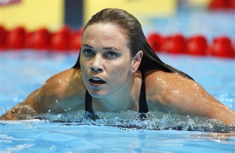 Natalie Coughlin swims from the pool after winning the women's 100m butterfly semifinal during the U.S. Olympic swimming trials in Omaha, Ne Natalie Coughlin swims from the pool after winning the women's 100m butterfly semifinal during the U.S. Olympic swimming trials in Omaha, Ne