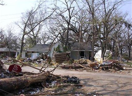 Damaged home is seen in Long Beach, Mississippi after Hurricane Katrina September 15, 2005. REUTERS/Carey Gillam Damaged home is seen in Long Beach, Mississippi after Hurricane Katrina September 15, 2005. REUTERS/Carey Gillam