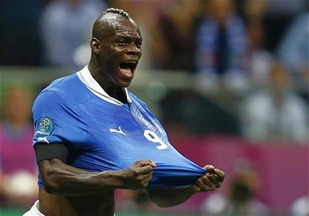 Italy's Mario Balotelli celebrates his goal against Germany during their Euro 2012 semi-final soccer match at National Stadium in Warsaw, Ju Italy's Mario Balotelli celebrates his goal against Germany during their Euro 2012 semi-final soccer match at National Stadium in Warsaw, Ju