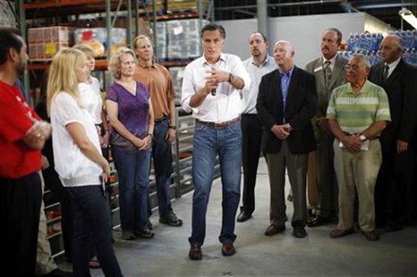Republican presidential candidate Mitt Romney speaks to workers and staff at the Care and Share of Southern Colorado food bank in Colorado S Republican presidential candidate Mitt Romney speaks to workers and staff at the Care and Share of Southern Colorado food bank in Colorado S