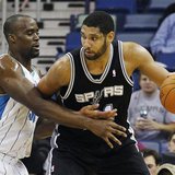 San Antonio Spurs center Tim Duncan (R) works against New Orleans Hornets center Emeka Okafor during the first half of their NBA basketball San Antonio Spurs center Tim Duncan (R) works against New Orleans Hornets center Emeka Okafor during the first half of their NBA basketball