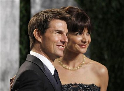 Actor Tom Cruise and his wife, actress Katie Holmes, arrive at the 2012 Vanity Fair Oscar party in West Hollywood, California February 26, 2 Actor Tom Cruise and his wife, actress Katie Holmes, arrive at the 2012 Vanity Fair Oscar party in West Hollywood, California February 26, 2