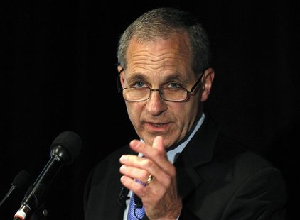 Former FBI director Louis Freeh (R) takes questions regarding his report on child abuse allegations against former Penn State assistant coac Former FBI director Louis Freeh (R) takes questions regarding his report on child abuse allegations against former Penn State assistant coac
