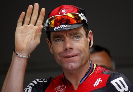 BMC Racing Team rider Cadel Evans of Australia waves to spectators before the start of the 13th stage of the 99th Tour de France cycling rac BMC Racing Team rider Cadel Evans of Australia waves to spectators before the start of the 13th stage of the 99th Tour de France cycling rac