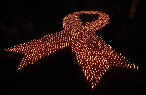 About 2880 candles are seen lit during a World AIDS Day event in Jakarta December 1, 2009. REUTERS/Dadang Tri About 2880 candles are seen lit during a World AIDS Day event in Jakarta December 1, 2009. REUTERS/Dadang Tri