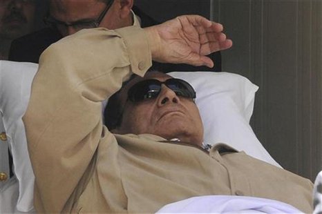Former Egyptian President Hosni Mubarak is wheeled out of the courtroom after his trial in Cairo June 2, 2012. REUTERS/Stringer Former Egyptian President Hosni Mubarak is wheeled out of the courtroom after his trial in Cairo June 2, 2012. REUTERS/Stringer