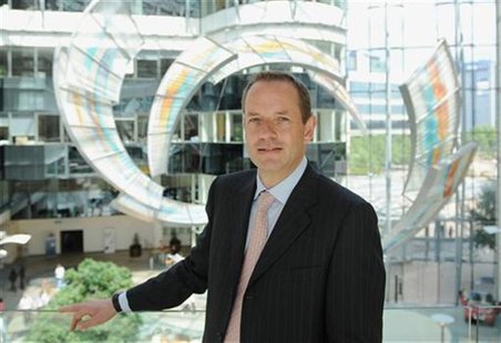 Chief Executive of GlaxoSmithKline, Andrew Witty, poses for photographers outside the company headquarters in west London July 21, 2008. REU Chief Executive of GlaxoSmithKline, Andrew Witty, poses for photographers outside the company headquarters in west London July 21, 2008. REU