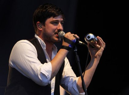 Marcus Mumford of British folk rock band Mumford and Sons performs at the Optimus Alive Festival in Alges, on the outskirts of Lisbon July 1 Marcus Mumford of British folk rock band Mumford and Sons performs at the Optimus Alive Festival in Alges, on the outskirts of Lisbon July 1
