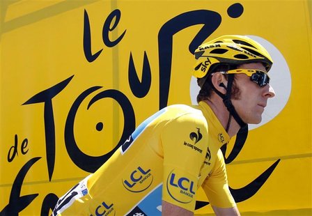 Sky Procycling rider Bradley Wiggins of Britain, wearing the leader's yellow jersey, prepares to start before the 15th stage of the 99th Tou Sky Procycling rider Bradley Wiggins of Britain, wearing the leader's yellow jersey, prepares to start before the 15th stage of the 99th Tou
