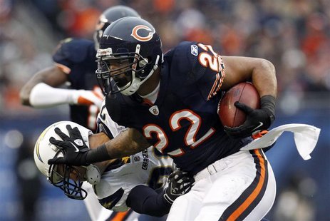 Chicago Bears running back Matt Forte (R) is brought down by San Diego Chargers' Steve Gregory (L) in the first half of their NFL football g Chicago Bears running back Matt Forte (R) is brought down by San Diego Chargers' Steve Gregory (L) in the first half of their NFL football g