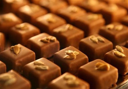 Chocolates topped with sunflower seeds are displayed during the 2nd Chocolate Fair in Barcelona October 21, 2006. REUTERS/Albert Gea Chocolates topped with sunflower seeds are displayed during the 2nd Chocolate Fair in Barcelona October 21, 2006. REUTERS/Albert Gea