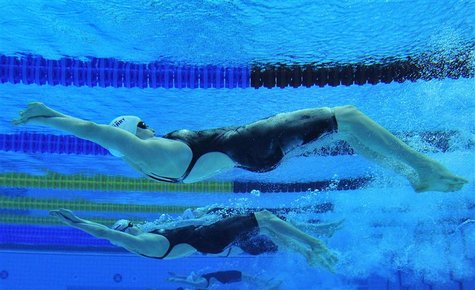 Swimmers compete in the women's 200m backstroke heats at the British Gas Swimming Championships 2012 at the Olympic Aquatics Centre in Londo Swimmers compete in the women's 200m backstroke heats at the British Gas Swimming Championships 2012 at the Olympic Aquatics Centre in Londo