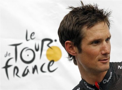 RadioShack-Nissan rider Frank Schleck of Luxembourg poses on the podium during the team presentation ahead of the start of the 99th Tour de RadioShack-Nissan rider Frank Schleck of Luxembourg poses on the podium during the team presentation ahead of the start of the 99th Tour de
