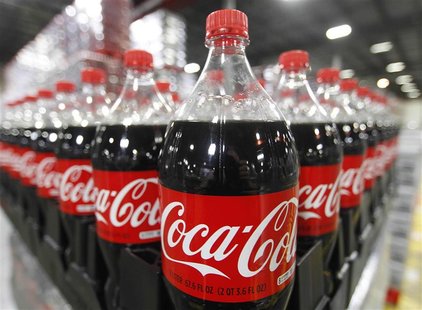 Bottles of Coca-Cola are seen in a warehouse at the Swire Coca-Cola facility in Draper, Utah in this March 9, 2011, file. Coca-Cola Co repor Bottles of Coca-Cola are seen in a warehouse at the Swire Coca-Cola facility in Draper, Utah in this March 9, 2011, file. Coca-Cola Co repor