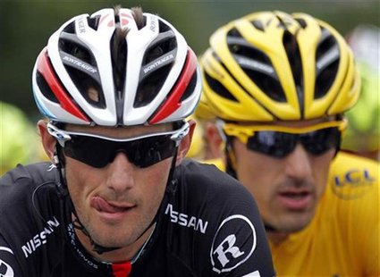 RadioShack-Nissan rider Frank Schleck (L) of Luxembourg cycles with teammate rider and leader's yellow jersey Fabian Cancellara of Switzerla RadioShack-Nissan rider Frank Schleck (L) of Luxembourg cycles with teammate rider and leader's yellow jersey Fabian Cancellara of Switzerla