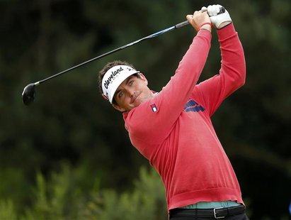 Keegan bradley of the U.S. watches his tee shot on the second hole during a practice round ahead of the British Open golf championship at Ro Keegan bradley of the U.S. watches his tee shot on the second hole during a practice round ahead of the British Open golf championship at Ro