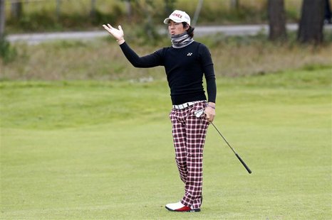 Ryo Ishikawa of Japan gestures after his shot on the third fairway during a practice round ahead of the British Open golf championship at Ro Ryo Ishikawa of Japan gestures after his shot on the third fairway during a practice round ahead of the British Open golf championship at Ro