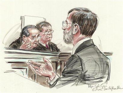 Deputy Solicitor General Edwin Kneedler (R) speaks to Justice Antonin Scalia (L) and Chief Justice John Roberts of the U.S. Supreme Court in Deputy Solicitor General Edwin Kneedler (R) speaks to Justice Antonin Scalia (L) and Chief Justice John Roberts of the U.S. Supreme Court in